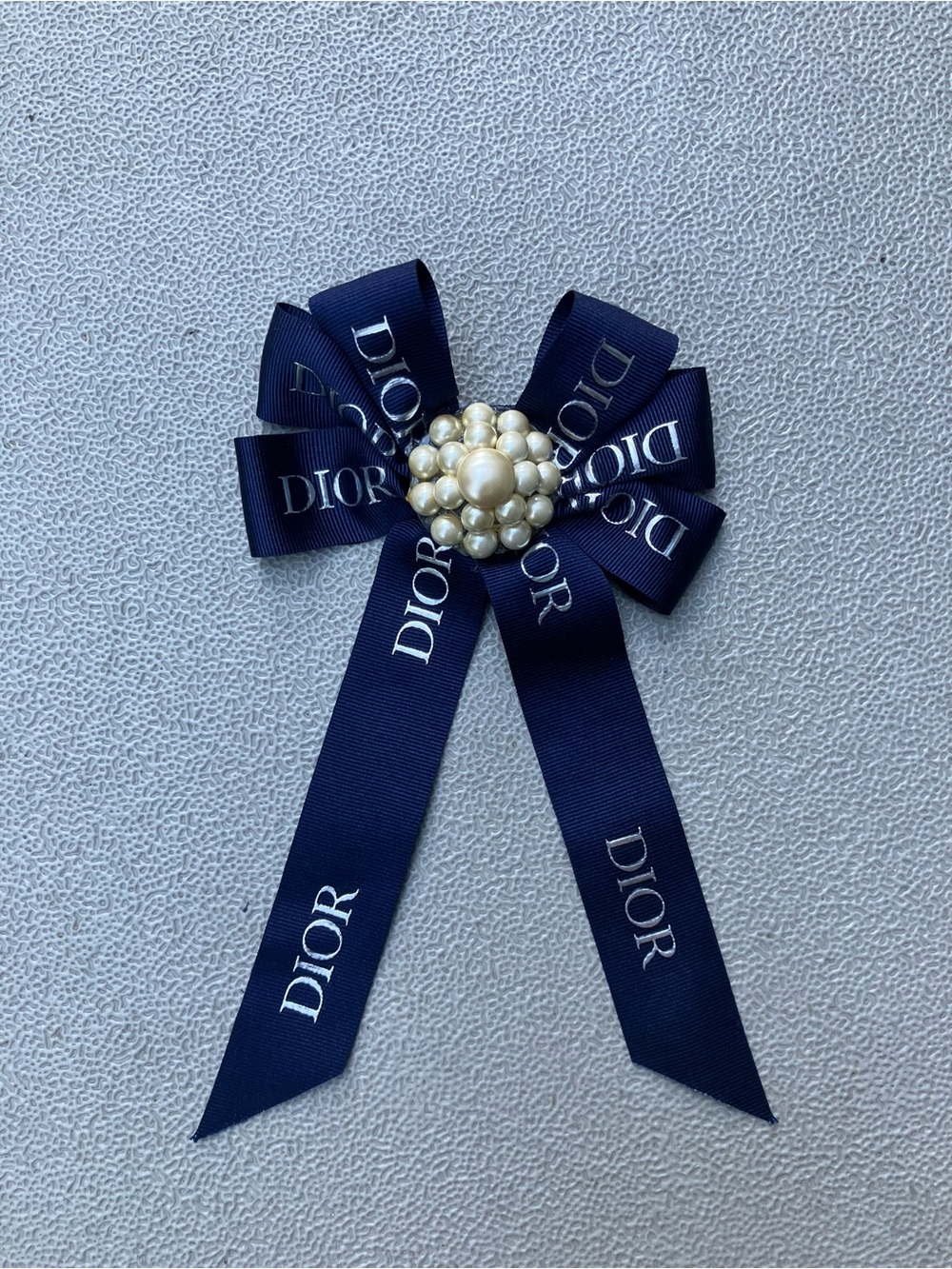 Handmade pearl and Navy ribbon